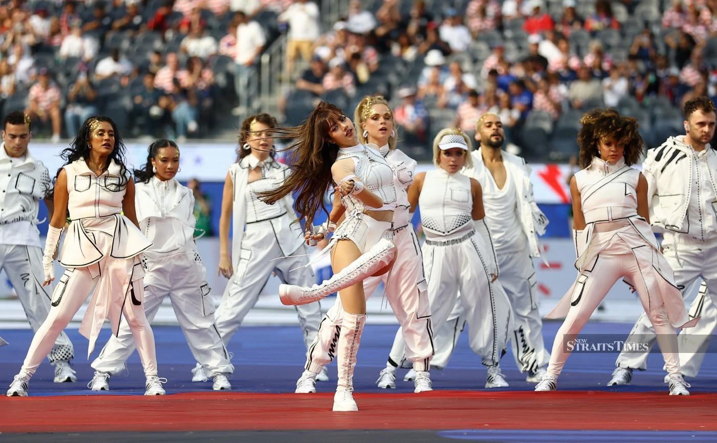 Lisa performs during the opening ceremony before the match. - Reuters PIC