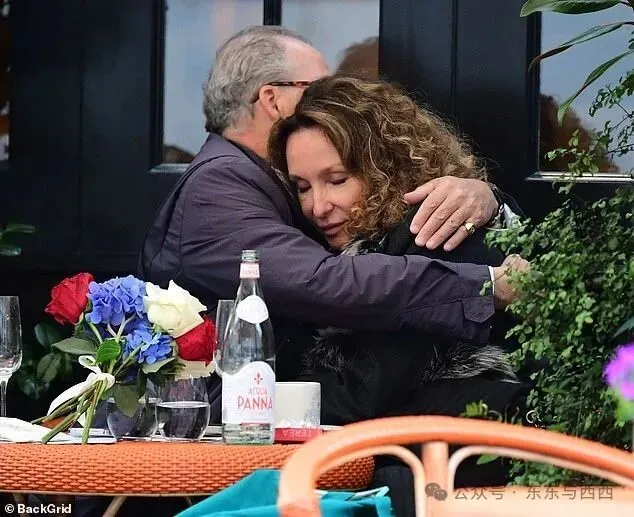 The couple also lovingly embraced as they dined al fresco style in the chilly London weather