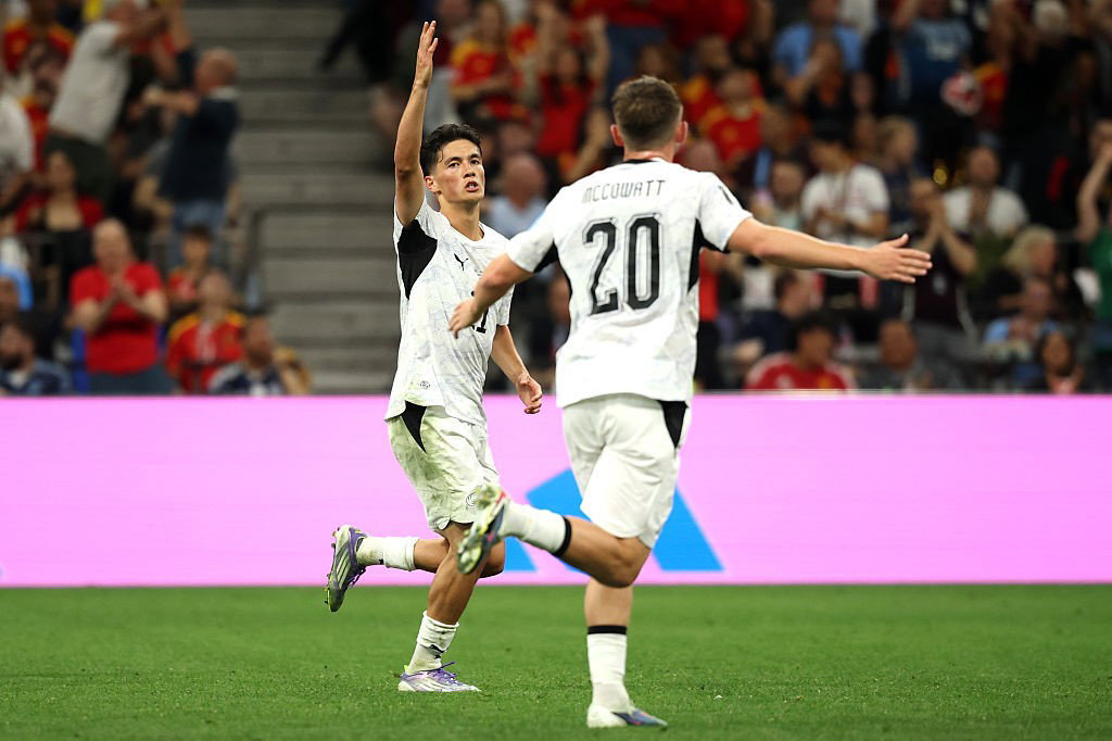 Eli Just celebrates his goal.