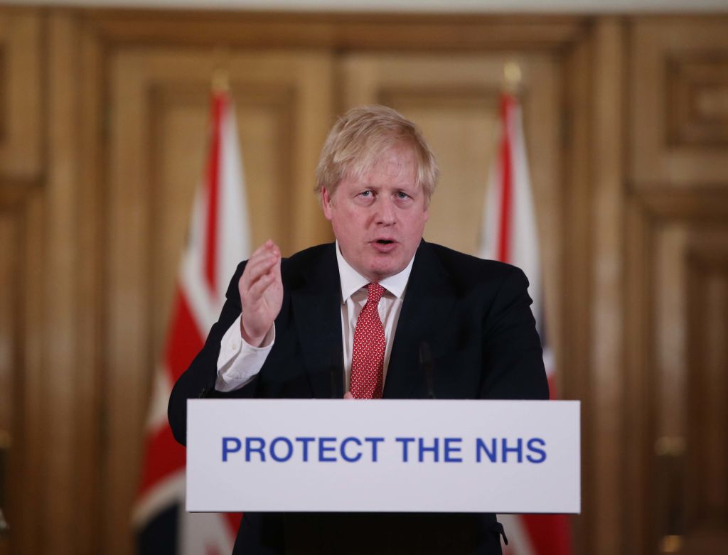 英首相：疫情高峰已过 考虑放松管控