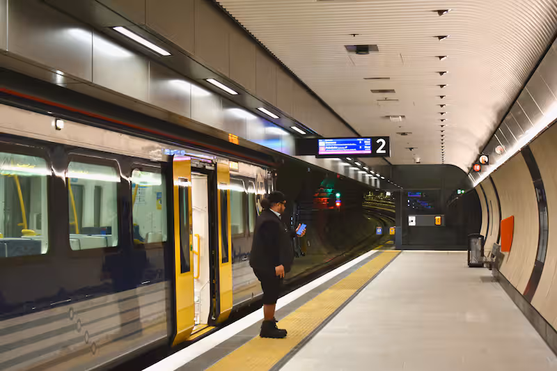 a-train-manager-on-the-platform-of-karanga-a-hape-station-KRINZA5AZJBRFD2PXUQ6ZTOGWI.jpg