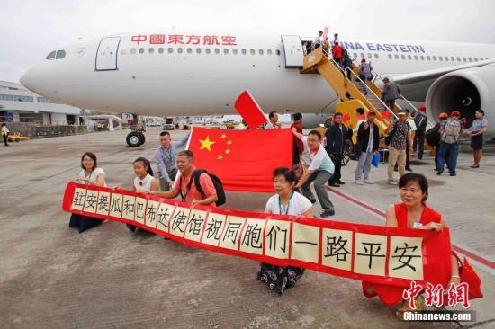 祖国包机带你们回家度国庆！加勒比海地区受困中国同胞回国