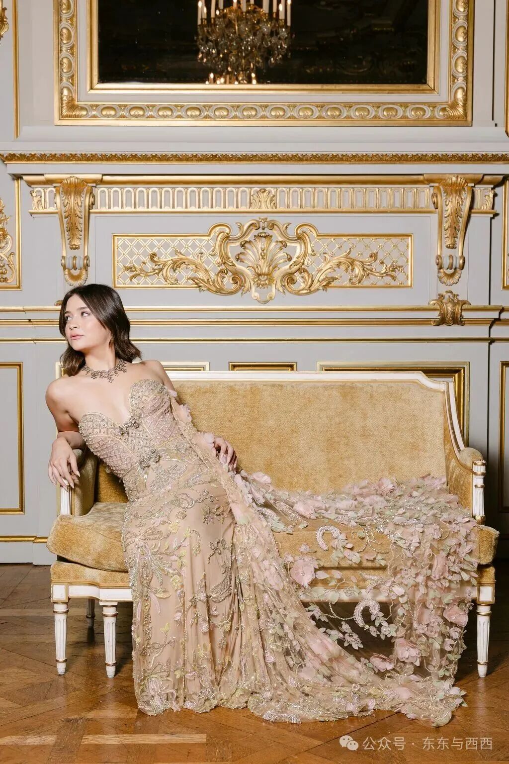 Image may contain Clothing Dress Fashion Formal Wear Gown Wedding Wedding Gown Person and Adult