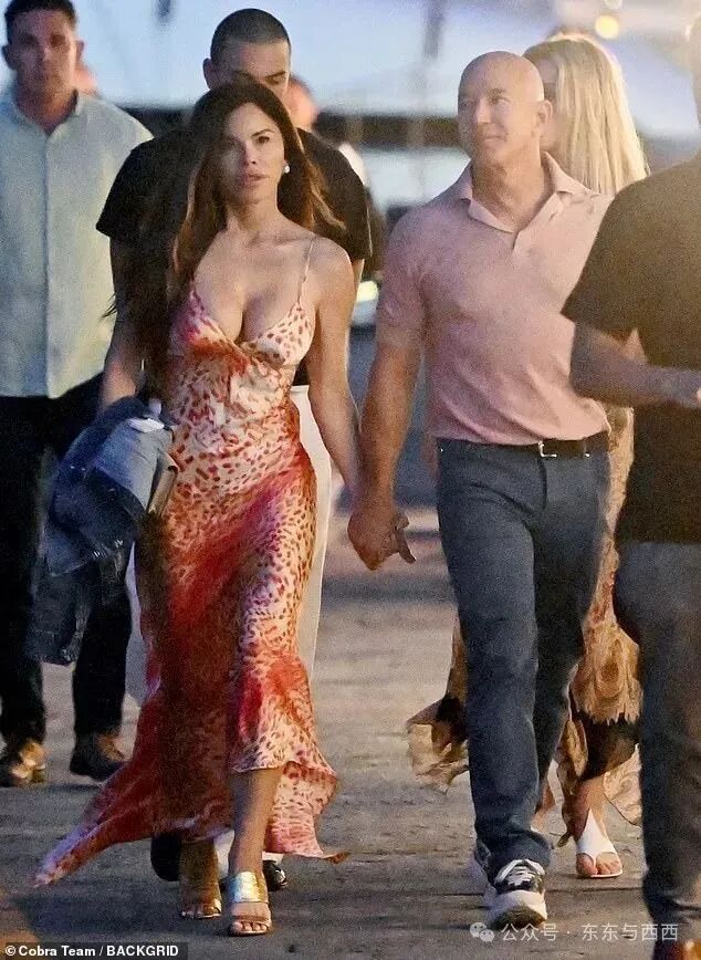 Lauren Sanchez nearly spilled out of her plunging dress as she stepped out in Italy with her fianc&eacute; Jeff Bezos and son Nikko Gonzalez on Tuesday evening