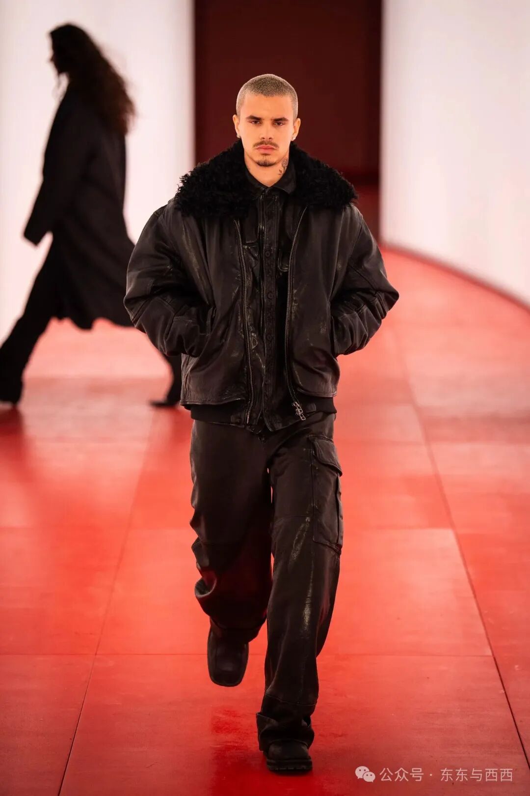 Romeo Beckham on the HampM runway in London.