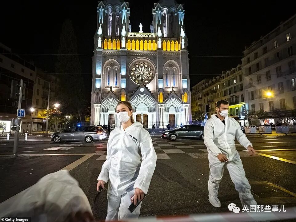 35025208-8894929-Forensic_officers_work_at_night_in_front_of_Notre_Dame_Basilica_-a-74_1604022599550.jpg