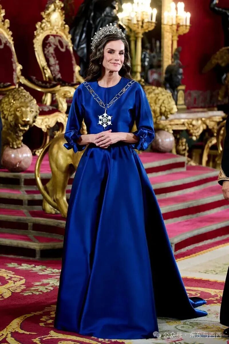 Queen Letizia turned heads in a deep blue gown by The 2nd Skin Co.