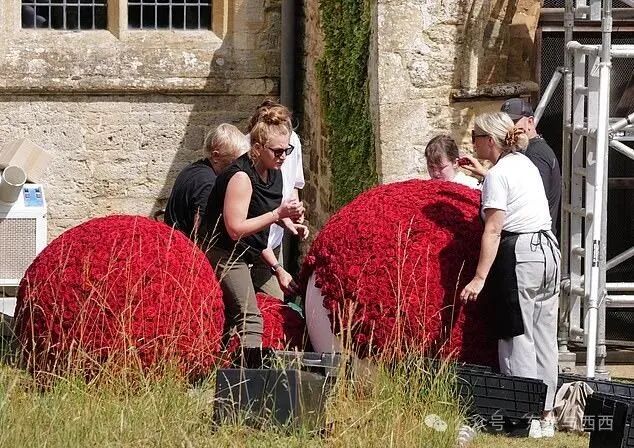 Last minute preparation for the society wedding of the year were underway in the Cotswolds today