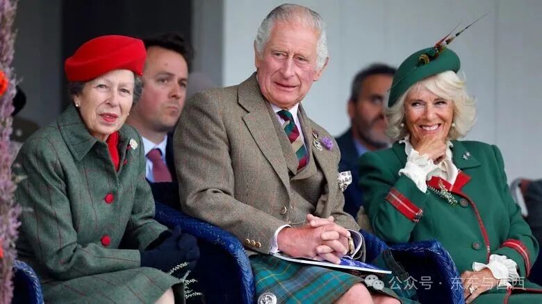 Princess Anne, King Charles, and Queen Camilla smiling