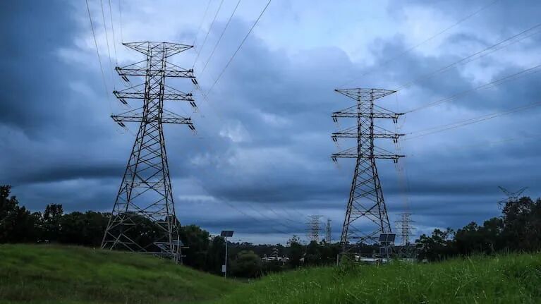 High voltage electricity transmission towers are seen at Warabrook on March 24, 2025 in Newcastle, Australia.